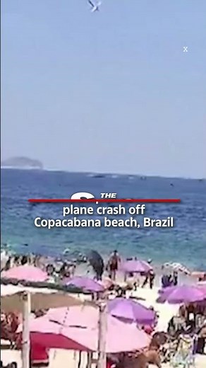 Plane nose dives into the sea killing the pilot in front of crowds on Copacabana beach, Brazil
