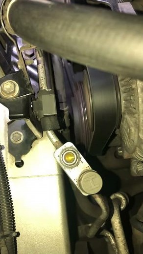 Lexus ES300 noisy sound from the ac compressor clutch pulley was resolved after replacing the belt.