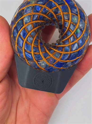 Celestial Flux F2 ✨ A short showcase of this handcrafted PEMF wellness coil, designed using sacred geometry and refined crystal composition. Built for balance, clarity, and intentional frequency sessions, the Celestial Flux blends modern wellness tech with elevated design and cosmic inspiration. Embedded with Blue Kyanite, Angel Aura , lapis lazuli tanzinite and Selenite. 🌀 To purchase this coil click the link below ⬇️⬇️⤴️ https://www.etsy.com/uk/shop/FluxCoils #frequencyhealing #PEMF #SacredGe