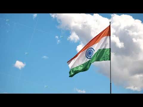 Indian flag waving in the wind on cloudy sky