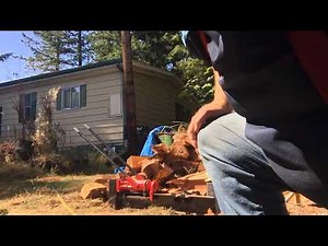 How to use a manual log splitter