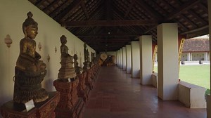 Download Vientiane, Laos - November 14, 2023 - Buddha Image or Buddha Statue at the hall oh Pha That Luang, Golden Stupa