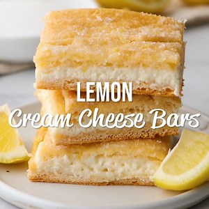5K views · 88 reactions | Lemon Cream Cheese Bars Recipe – super easy dessert for a crowd! Crescent rolls, cream cheese, lemon, sugar, vanilla extract, and melted butter. Bursting with lemon flavor! FULL RECIPE: https://www.plainchicken.com/lemon-cream-cheese-bars/ | Plain Chicken | Facebook
