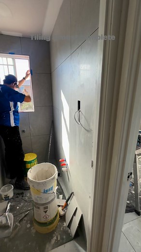 Tiling almost complete at our Menai 600x600 tiled bathroom #tiling #BathroomTiling #tilingBathroom #walltiling #tilinglife | Curtis Constructions