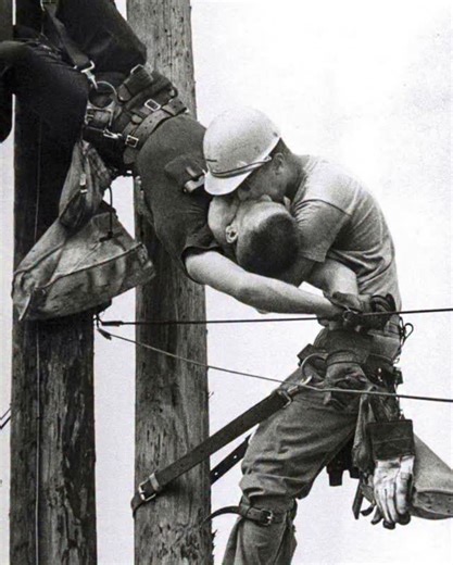 Infamous Boundaries on Instagram: "It was July 17, 1967. During routine work on a power line, lineman Randall G. Champion came into contact with a live wire carrying over 4,000 volts. The powerful surge knocked him unconscious, leaving him hanging helplessly in his safety harness, swaying in the open air nearly twenty feet above the ground. Below, panic erupted. Shouts filled the street. But one man didn’t hesitate. J.D. Thompson — his coworker, his friend — ran to the pole and began climbing. W