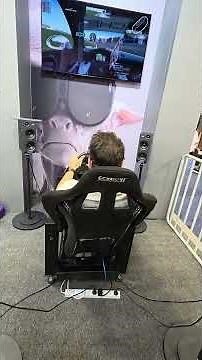 Immersive Racing Simulation with VR Headset & Motion Chair at CES 2026