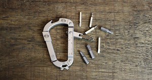 Octo carabiner multi-tool sports a fold-out bit driver/glass breaker
