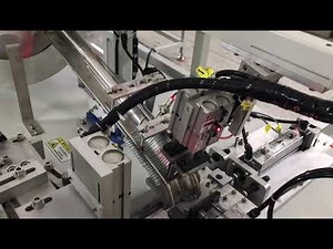 Fully auto clothes hanger hook inserting assembly machine