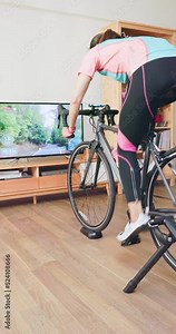 woman ride exercise bike