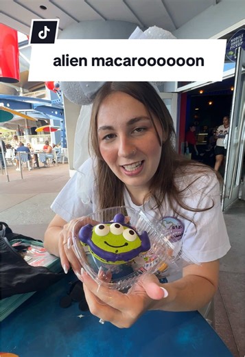 trying the seasonal alien macarooooooon from pizza planet!! this was yummy for me, nick doesn’t like blueberries so that’s probably why he doesn’t like it as much… #disney #disneyland #disneylandcalifornia #disneyfood #foodreviews