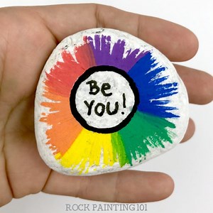 2.8K views · 128 reactions | Grab a sticker dot to create this fun rainbow rock design! See all of our rainbow rocks here - https://rockpainting101.com/rainbow-rock-tutorials/ | Rock Painting 101 | Facebook