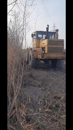 Heavy-Duty Tractor Tilling Barren Fields