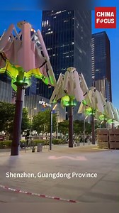 Tech on the streets of Shenzhen! Electric umbrellas automatically open and close, blending cutting-edge tech with everyday life. | China Focus
