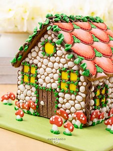 You don't have to wait until Christmas to make a gingerbread house! I made this Fairy Garden Gingerbread House using my gingerbread house kit. It comes with pre-baked house panels, royal icing mix, food coloring, and tools to create one yourself! https://globalbelly.com/collections/sweetambs/products/fairy-garden-gingerbread-house-kit-by-sweetambs If you prefer to bake yours from scratch, you can get my recipes and full video tutorial in my Cookie Art Club: https://sweetambs.mn.co | SweetAmbs