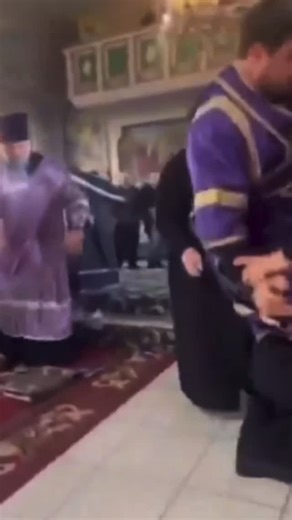 Theophan on Instagram: "Orthodox Subdeacon protects bishop from a soldier. During a liturgy in the Ukrainian city of Khmelnytsky a Ukrainian soldeir stormed the cathedral and threw the Holy Bible threatening the bishop. Video is from 2024."