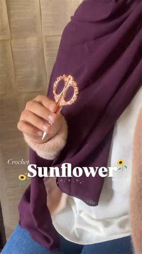 @ema_crochets on Instagram: "This can be our new hijab buddy🌻✨ [ema crochets, crochet, crochet sunflower, sunflower, mini clutch, hair accessorie, gift idea, super cute, handmade,handcrafted, love plant, fyp, yarn, hearts, for her, symbol of love, viral, trend, Instagram]"