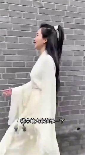 A Chinese woman demonstrates walking on walls and rooftops.#Chinese kung fu