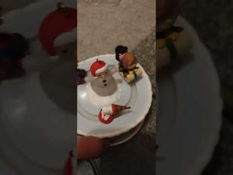 Animated peanuts ice skating ornament from Hallmark