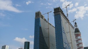 Skyscraper construction and cranes time lapse - Free Stock Video