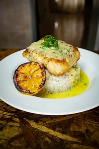 Recipe: Fish with Lemon Garlic Butter Sauce and Coconut Rice Ingredients For the Coconut Rice - 2 cups long grain rice - 2 cans of coconut milk (800ml) - Coriander - Salt & Pepper For the Sauce - 1/2 cup chicken stock - 1/2 cup milk - 3 tsp garlic - 1/4 cup minced onion - 16 tbsp butter (225g) - 1 tbsp flour - Parsley Salt and Pepper | Kenneth Tebogo Middleton