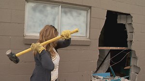Neighbors take first swings at tearing down crime-ridden Salt Lake motel