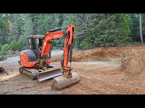 Range backstop dig out with the Kubota KX 040 4 excavator