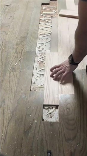 Craftsman Carefully Carving Intricate Patterns Into Natural Wooden Material