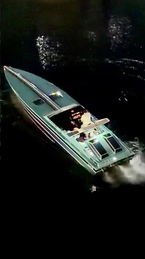 The Iconic & Authentic Miami Vice Scarab after dark in Miami