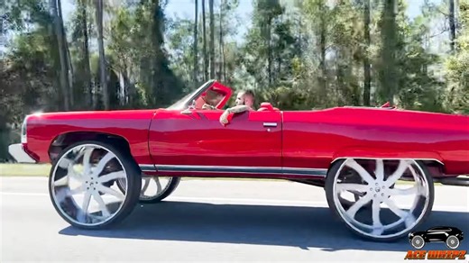 Candy Brandywine 73 Chevy vert on 34" Forgiato wheels