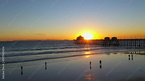Aerial of Newport Beach Pier and Beach at Sunset