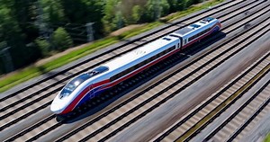 Download modern high-speed train moves quickly on rails, top view for free