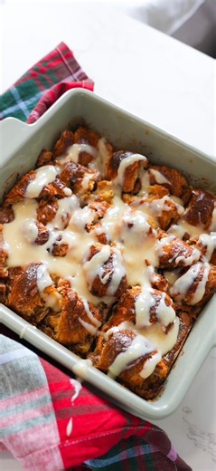 Croissant Bread Pudding with rum sauce. Find the full recipe here https://thereisfoodathome.com/recipes/croissant-bread-pudding/ | Theres Food At Home