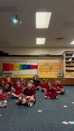 Reinforcing quarter and eighth notes with rhythm sticks in first grade music! | Rowena Johnson Primary