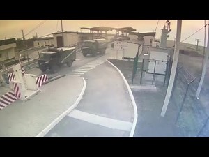 CCTV footage shows Russian military crossing Crimea border checkpoint | AFP