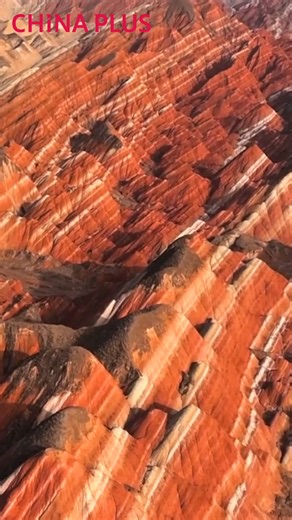 Known as the "magnificent rainbow hills," the Zhangye Danxia landform in northwest China's Gansu Province is composed of differently colored layers in separate layers of red sandstone, carved by eons of wind and water erosion. Its evolution over time demonstrates the infinite power of nature. #FunChina #DeepeningReform #3rdplenum #BeautifulChina | China Plus Culture