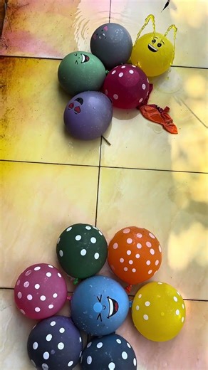 POPPING COLORFUL WATER BALLOONS