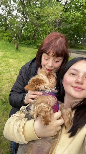Enjoying a Day Out with a Small Dog in the Park