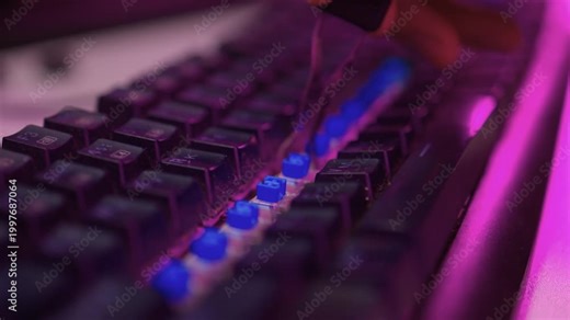Removing and replacing keyboard keycaps. Detailed view of keycap swapping on keyboard. Vivid scene demonstrating removal and installation of keycaps on mechanical keyboard