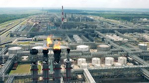 Metal constructions of the oil refinery with flare stacks