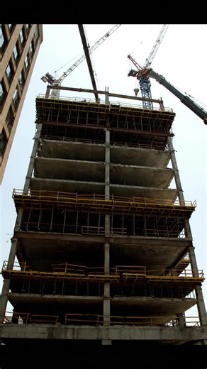 Ultra-real construction accident caught on camera… crane slams into building — collapse caught on a street-level vlog 😳🏗️