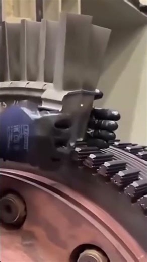 A special tool that is being assembled by a worker