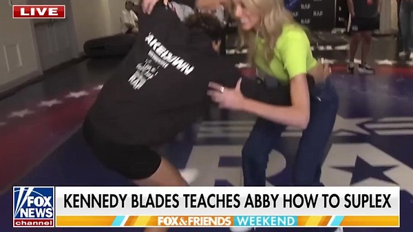 Fox News reporter Abby Hornacek gets body slammed