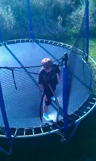 Kids pants fall off while hes doing a flip