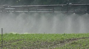 tractor spraying agriculture crop field, machinery sprayer detail