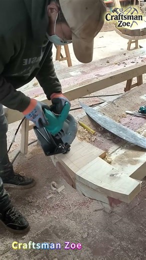 The carpenter is using wood to make coffin board components