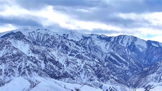 Kunlun Mountains: Snow-capped serenity in Hotan's winter