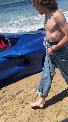 Sports Car Gets Stuck in Sand at Beach - 1439434