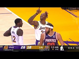 Dwight Howard doing the Dikembe Mutombo finger wag after blocking this shot