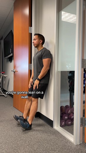 Technique tips for the tibialis anterior raise “shin curls”. Lean on a wall with the feet positioned 12-18 inches away. Raise the toes toward the shins, squeeze, and repeat. #exercisetips #fitnesstips #gym