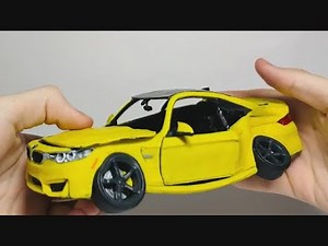 Watch Him Crush a BMW With His Bare Hands—Made From Modeling Clay!